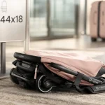 Cybex coya pliée en mode cabine, idéale voyage avion