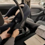 Siège auto dès la naissance dos à la route avec base ISOFIX