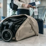 Poussette pockit pliée en sac cabine pour voyager